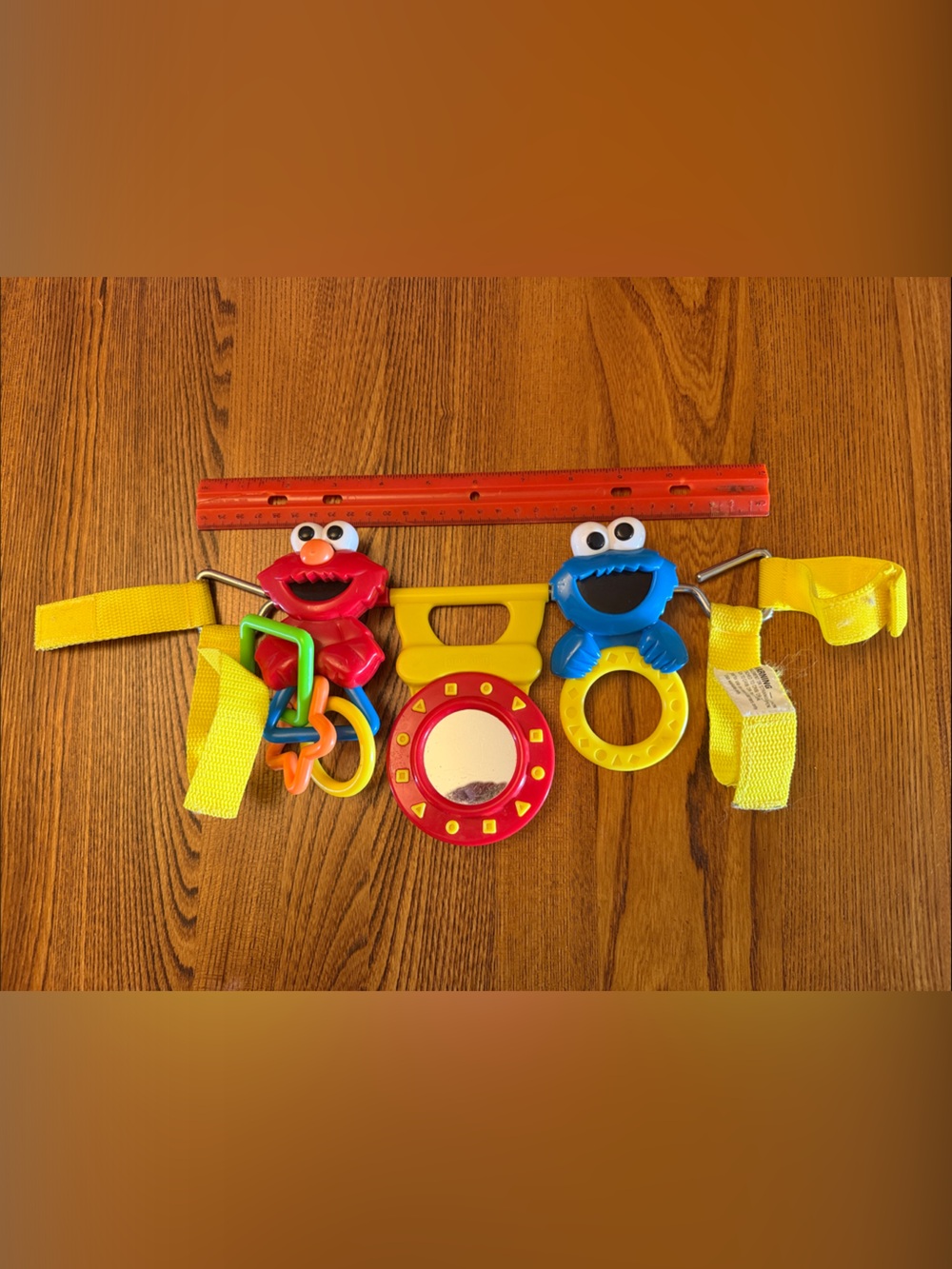 Vintage (1996) Sesame Street Character Stroller Toy Bar with Yellow Straps